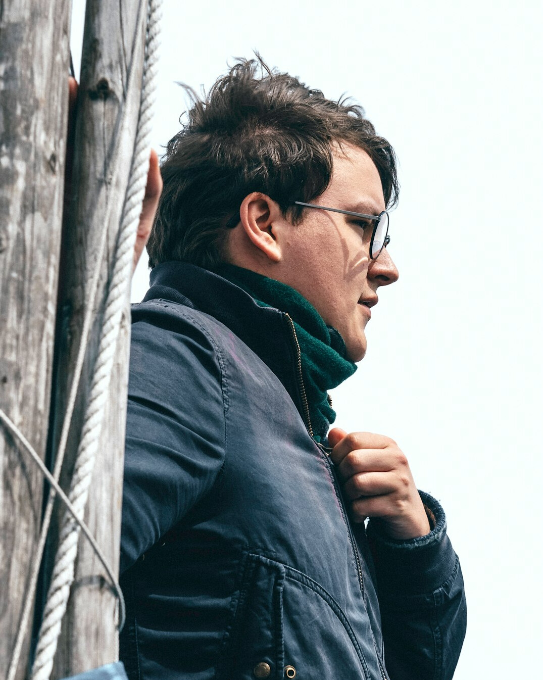 Portrait of a British man in a navy jacket, studio operations lead